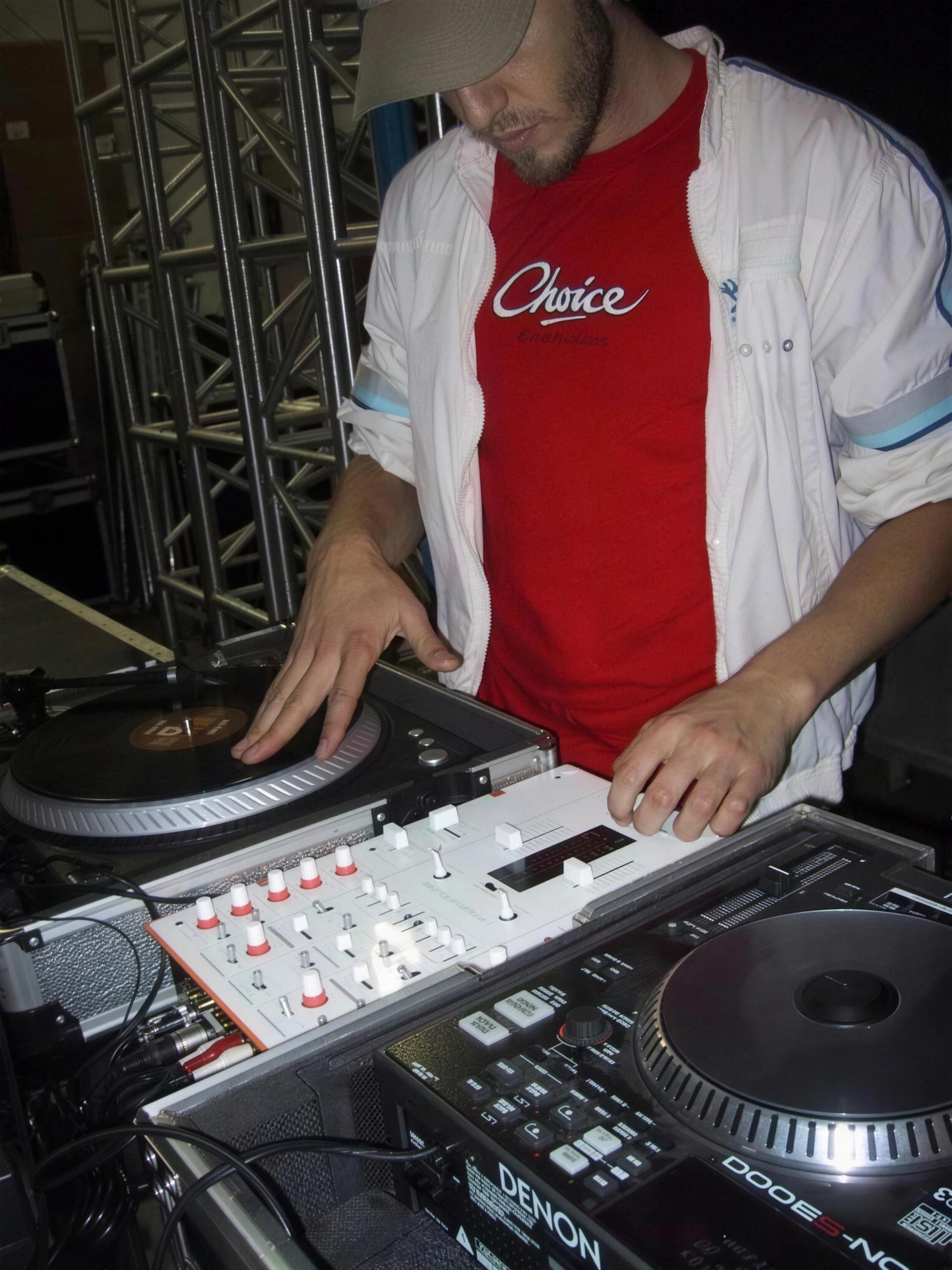 JDL Quake on the decks wearing a Choice Records jacket